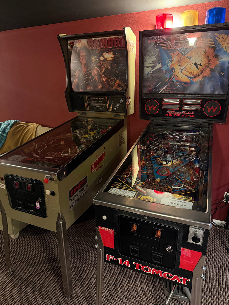 Rambro and F-14 Tomcat pinball machines side by side